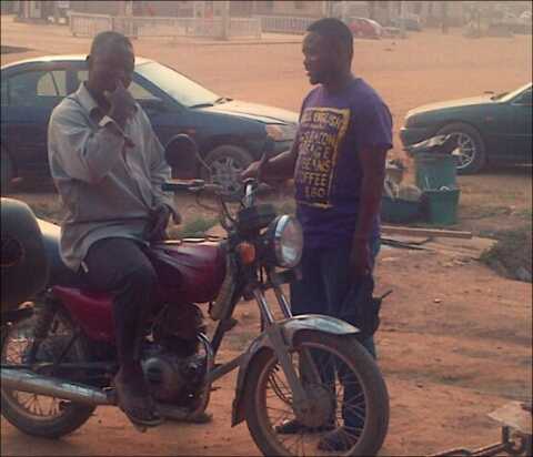 Azadus spotted negotiating with an Okada driver