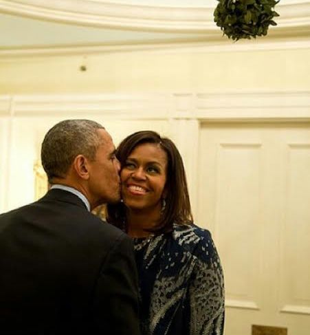 Barack Obama & Wife, Michelle Share Intimate Pose As He Kisses Her (Photo)