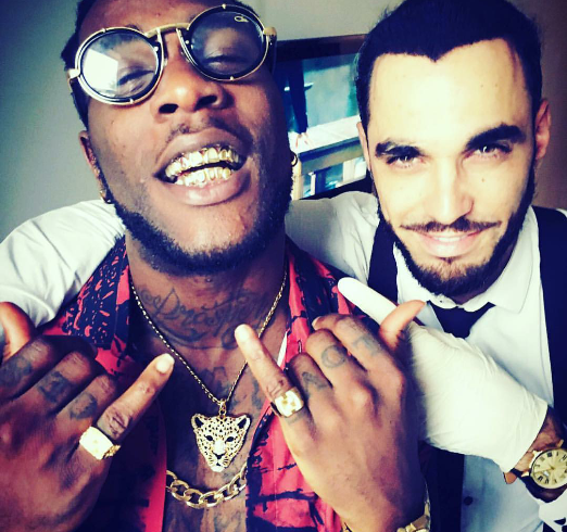 Burna Boy Shows Off His 18k Gold Grills In New Photo
