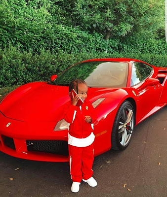 Tyga's Son Pictured Posing With His Dad's Ferrari